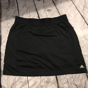 Adidas women’s golf/tennis skort.